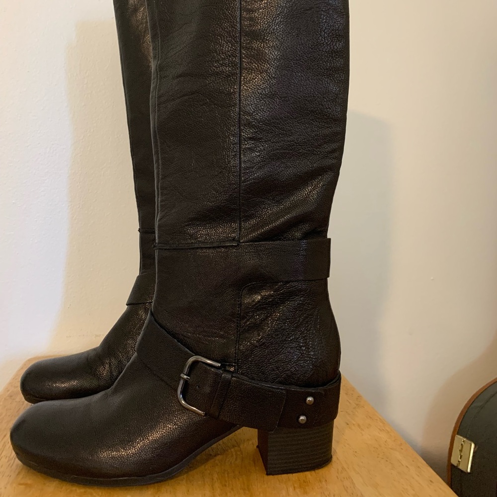 100% Italian leather, knee-high boots in near perfect condition.